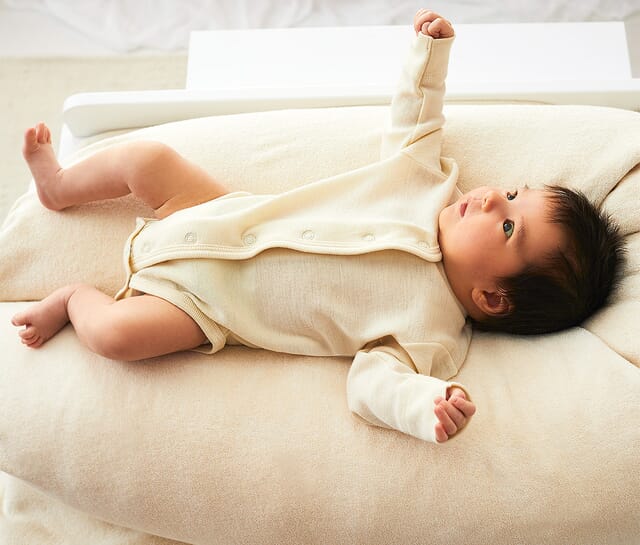 Baby bodysuits made from 70% organic merino wool & 30% silk.