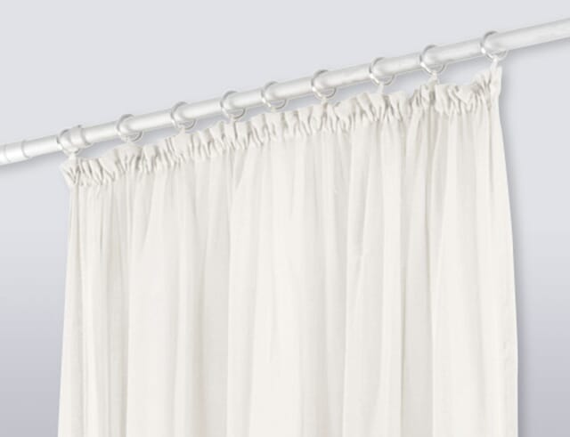 Curtains with pleated tape.