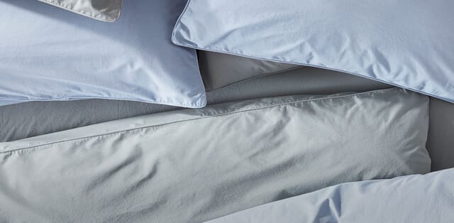 Nachhaltige Bettwäsche mit Hotelverschluss.	